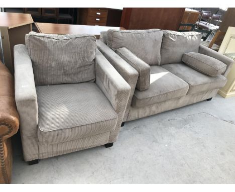 A COD TWO SEATER SOFA AND ARMCHAIR 