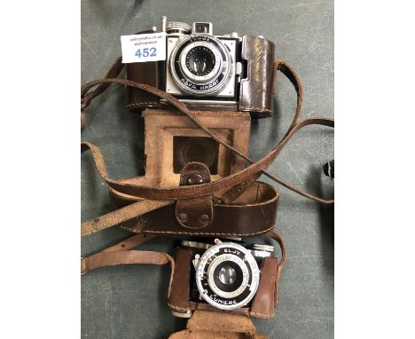 A RARE 'ELJY' LUMIERE CASED MINIATURE CAMERA TOGETHER WITH A 'AGFA KALAT' GERMAN CASED CAMERA (2) 