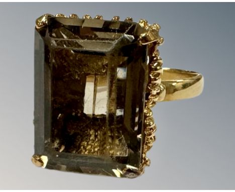 An 18ct yellow gold smokey quartz ring, R 1/2, 18 mm x 13 mm, 9.6g.