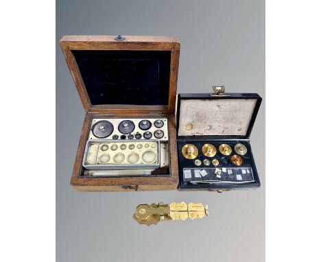 Two sets of antique weights, one by Brady &amp; Martin of Newcastle, together with a set of sovereign scales.