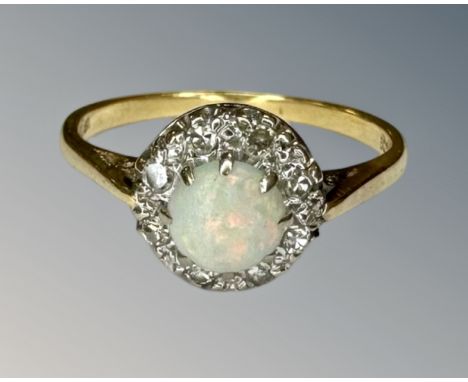 An antique 18ct gold opal and diamond ring, size N½.