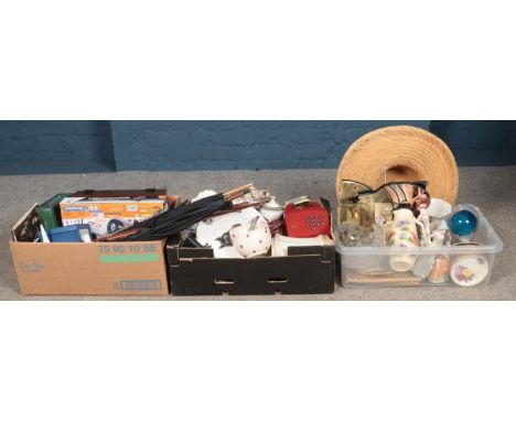 Three boxes of miscellaneous items, to include E. Radford jug, cabinet plates, boxed games, walking sticks etc.  