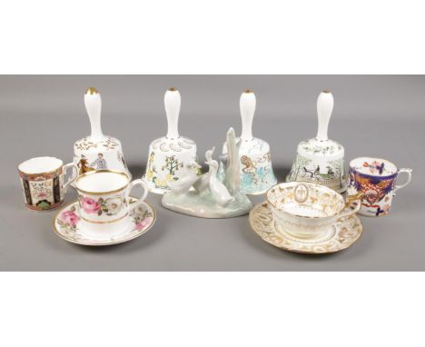 A collection of bone china. Includes Royal Crown Derby, Cauldon, Hammersley annual bells, Nao etc.  