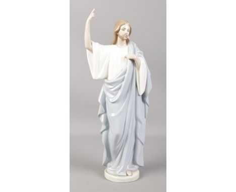 A large Nao ceramic figure depicting Jesus. 34cm high.  