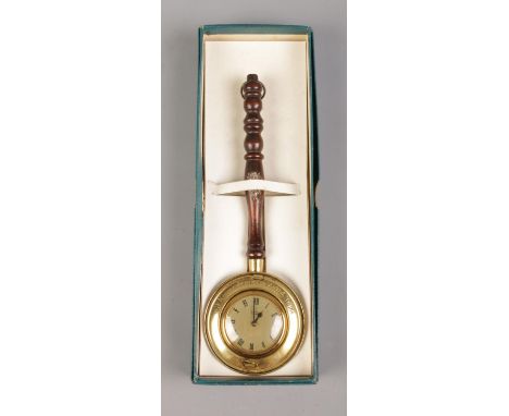 A boxed Smiths hanging wall clock, in the form of a miniature bed pan. 23cm long.  