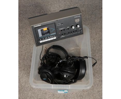 A Coomber Model 393 recorder along with six sets of Coomber headphones.  