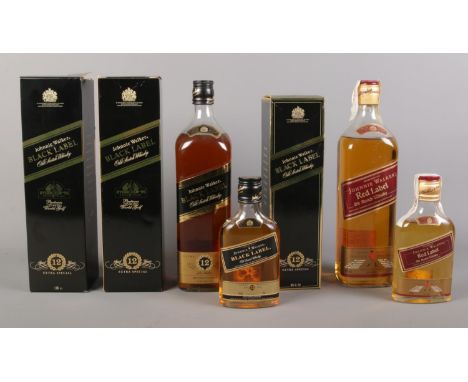 Seven bottles of Johnnie Walker Old Scotch Whisky. To include 3 x black label 12 years extra special 1 litre bottles (2 boxed