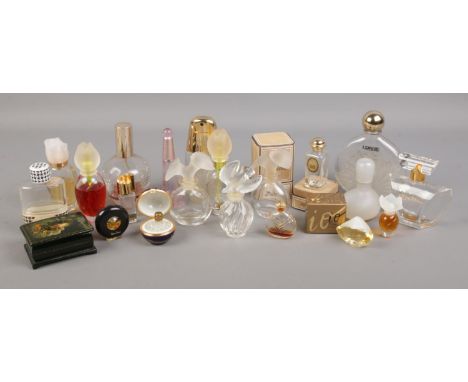 A collection of glass scent bottles. Includes Lalique Nina Ricci example, Hermes, Christian Dior etc.  