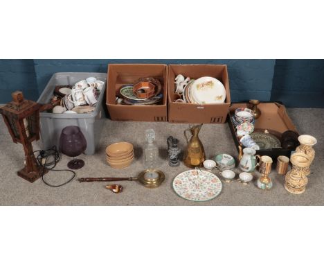 Four boxes of miscellaneous. Including wooden table lamp, metalwares, cabinet plates, glass decanters, etc.  