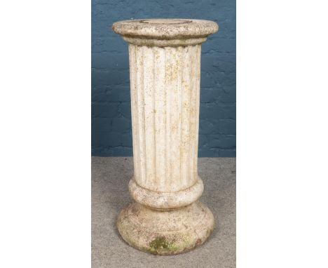 A large Corinthian garden column, with stepped base. Height: 78cm, Diameter of top: 34cm.  Heavy item