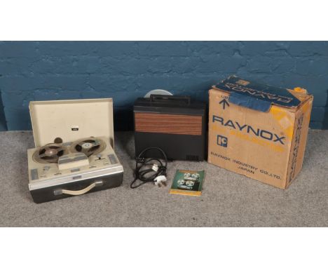 A boxed Raynox 8mm projector and a vintage Fidelity Playmaster reel to reel tape recorder.  