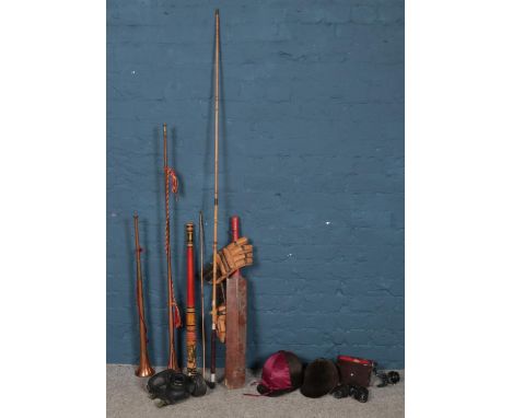 A box of miscellaneous. To include two copper and brass hunting horns, a crown cased pair of binoculars and two children's ri