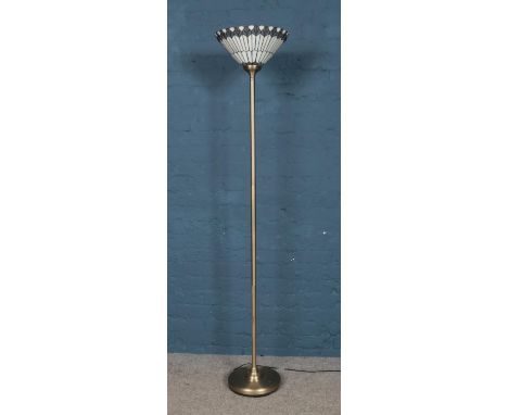 A standard lamp with Tiffany style up lifter light shade. H: 182cm.  Untested.