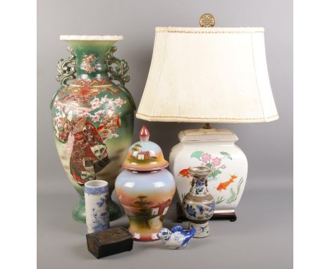 A small collection of oriental items, to include a large vase, table lamp, hinged lidded tray and vase.  Small multi-coloured