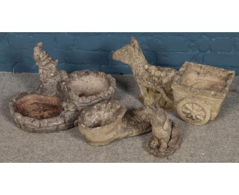 Four garden ornaments. Including donkey and cart planter, etc.  