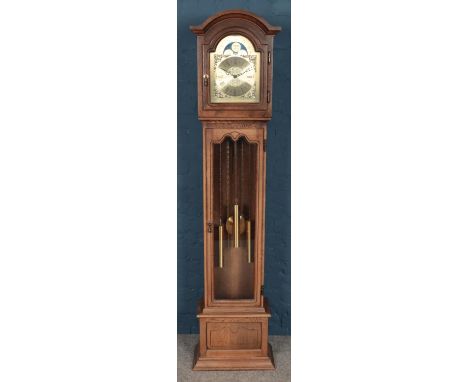 An oak longcase clock. With gilt moon roller dial. (188cm)  