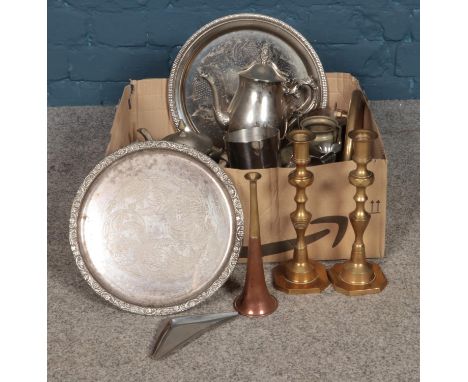 A large box of metalwares, to include a pair of brass candlesticks, copper bugle and several Swedish examples, including serv