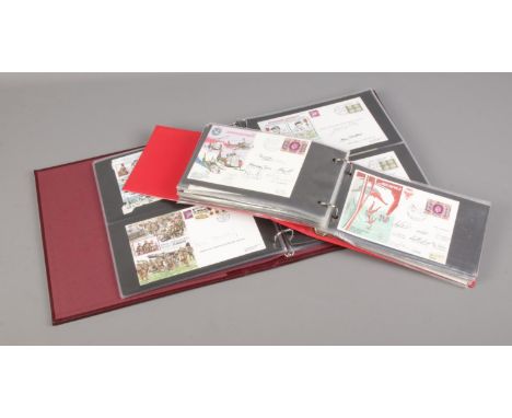 Two albums of first day covers (approximately 90), including many signed and multi signed editions and Winston S Churchill, t