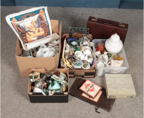 Four boxes of miscellaneous. Includes model aeroplanes, Monopoly, briefcase, shells, hip flask etc.  