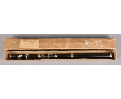 A boxed Miller Browne &amp; Co marching flute, displaying broad arrow mark and stamped 1930. 50cm long.  Broad arrow mark has
