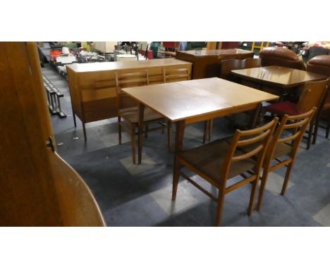 A Vintage Dining Room Suite Comprising Sideboard Pull Out Dining Table and Four Ladder Back Chairs 