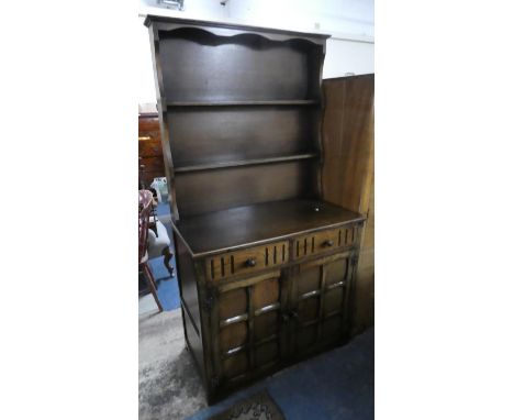 An Oak Two Drawer Dresser with Base Cupboard and Two Shelf Plate Rack, 92cm Wide 