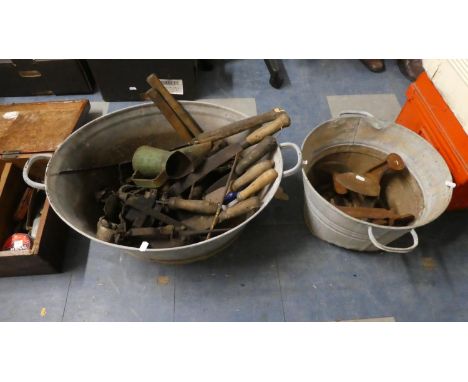Two Galvanised Baths Containing Vintage Tools, Shoe Lasts, Gin Traps etc 