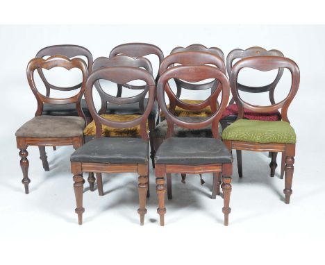 A harlequin set of ten Victorian mahogany balloon back dining chairs 
The majority with serpentine seats ring turned tapering