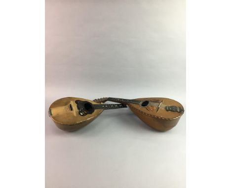 TWO ITALIAN MANDOLINS, one labelled la mondiale catania and the other il globo, both inlaid wit tortoise shell and mother of 