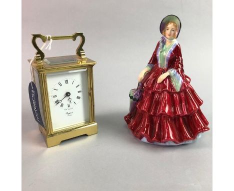BRASS RAPPORT CARRIAGE CLOCK, with Roman numeral chapter ring; along with a Paragon figure of Lady Gwendeline (2)