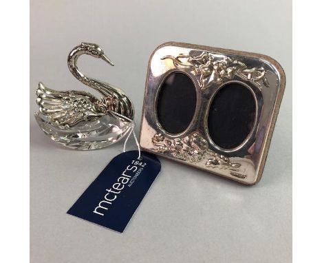 SMALL SILVER DOUBLE PORTRAIT FRAME, along with a silver and glass salt dish in the form of a swan, with spoon (3)