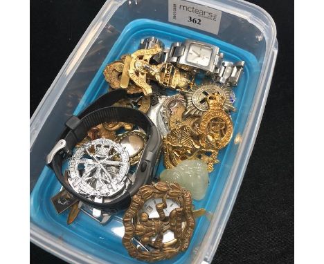 LOT OF MILITARY CAP BADGES, along with silver fobs, a jade pendant, jewellery, watches, badges, etc
