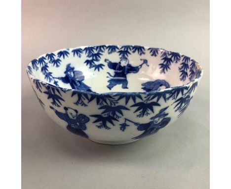 ASIAN BLUE AND WHITE BOWL, depicting children playing, with mark to base; along with three blanc de chine figures (4)