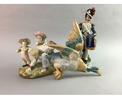 TWO CERAMIC FIGURES, along with a wall hanging duck