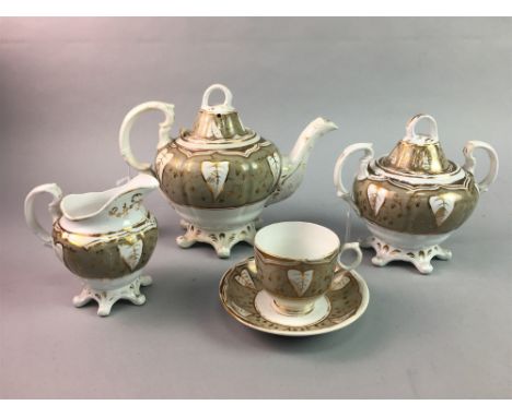 GILT DECORATED PART TEA SERVICE, including tea pot, 8 cups, 10 saucers, two sandwich plates, side plate, cream and sugar; alo