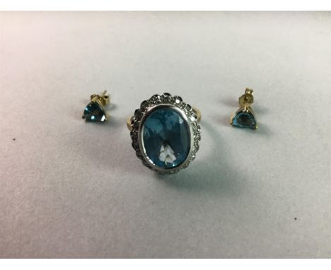 BLUE GEM SET AND DIAMOND RING, along with a pair of blue gem set earrings