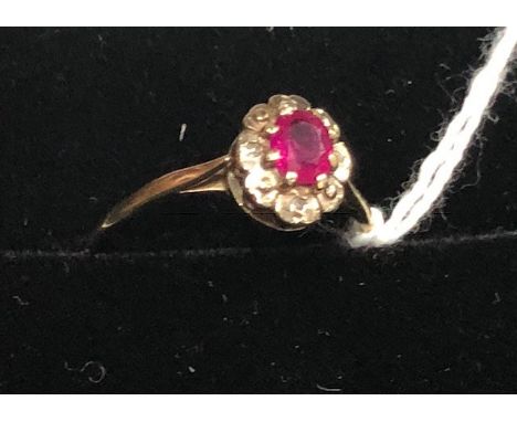 RUBY AND DIAMOND NINE CARAT GOLD RING