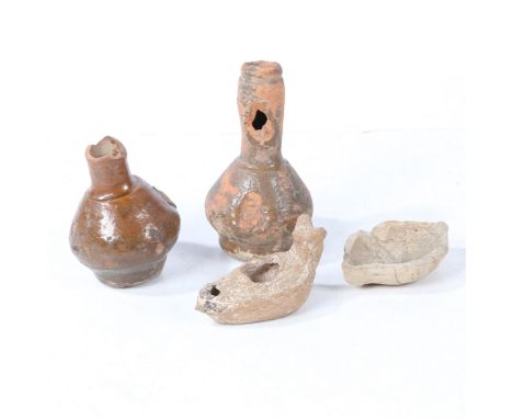Together with a Holy Land oil lamp and two pottery bottled, one with an old find label to the base, (4).