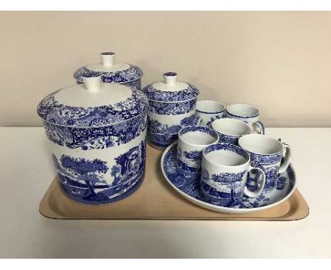 A tray of six pieces of Spode blue and white china, three lidded storage jars, six mugs and a shallow bowl 