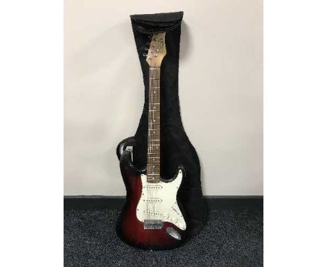 A Stagg Stratocaster electric guitar (copy) in carry bag 