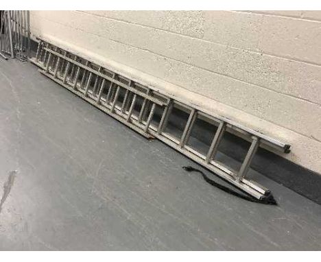 An aluminium extension ladder and one other (on view in ground floor corridor) 