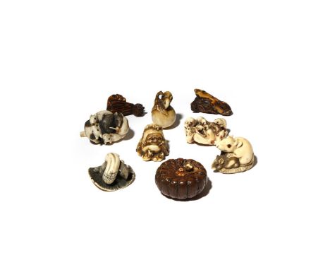 NINE JAPANESE IVORY NETSUKE OF RATS MEIJI PERIOD, 19TH CENTURY One with a small rodent peeking out of a wood pumpkin; three e