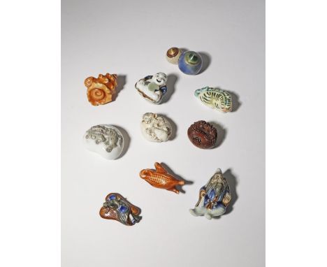 NINE JAPANESE HIRADO PORCELAIN NETSUKE MEIJI PERIOD, 19TH CENTURY One depicting Shoki the Demon Queller, another Hotei, other