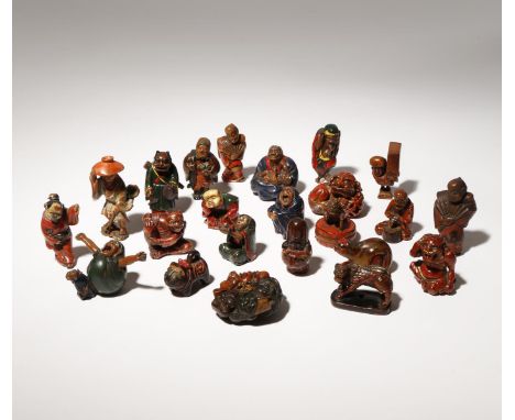 A COLLECTION OF TWENTY-THREE WOOD AND LACQUER NETSUKE EDO PERIOD AND LATER, 18TH CENTURY AND LATER Some in negoro style and o