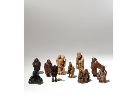 TEN JAPANESE WOOD NETSUKE OF FIGURES MEIJI PERIOD, 19TH CENTURY Variously depicting travellers, entertainers, itinerant manza