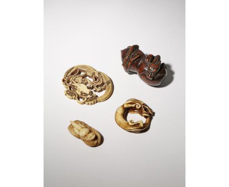 FOUR JAPANESE NETSUKE OF DRAGONS EDO AND MEIJI PERIOD, 18TH AND 19TH CENTURY Two in ivory, the first of flattened form and de