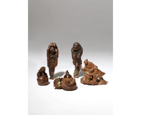 FOUR JAPANESE WOOD NETSUKE OF FIGURES EDO PERIOD AND LATER, 18TH CENTURY AND LATER One depicting a tall sennin standing on on