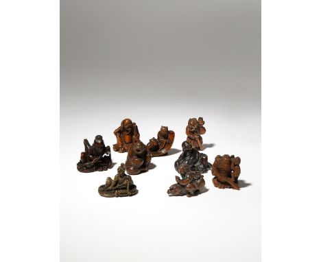 NINE JAPANESE WOOD NETSUKE OF LEGENDARY FIGURES EDO PERIOD AND LATER, 18TH CENTURY AND LATER Variously depicting figures from