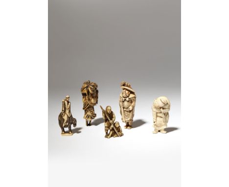 FOUR JAPANESE IVORY NETSUKE MEIJI PERIOD, 19TH CENTURY One carved as Shoki the Demon Queller with a small oni on his large br