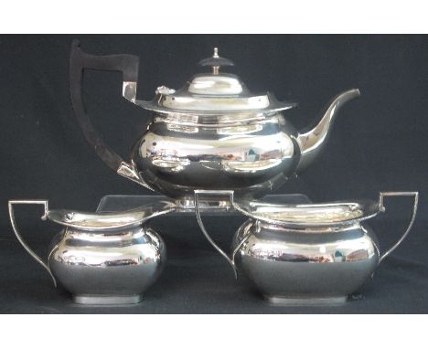 MID 20TH CENTURY SILVER, THREE PIECE TEA SET comprising: teapot; cream jug and two handled sucrier of rectangular form, Sheff